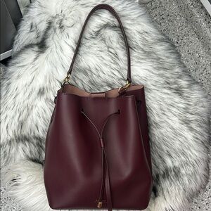 Lauren Ralph Lauren Burgundy drawstring bucket bag.